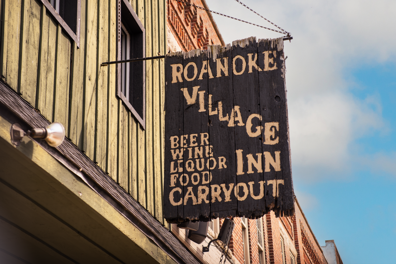 Roanoke village inn sign