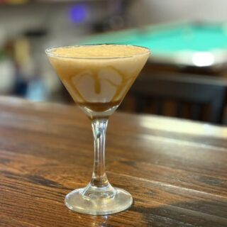 The Pickle Drink with pool table in back